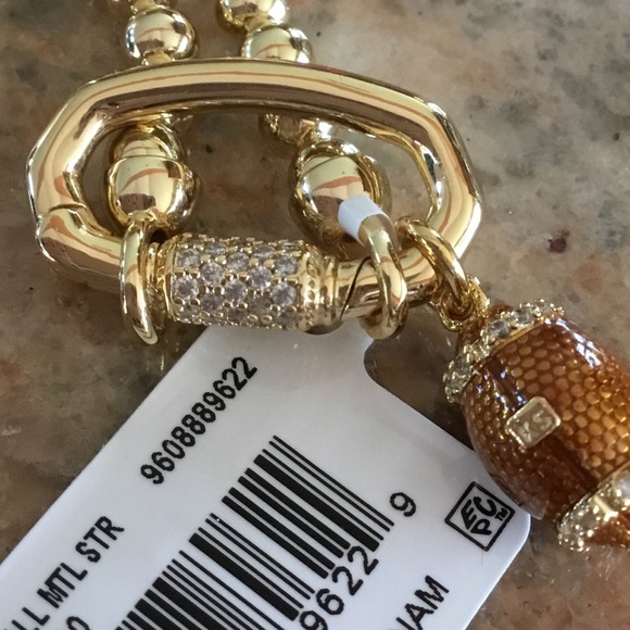 Kendra Scott Gold Metal Strand Football Pendant Necklace - Picture 7 of 8